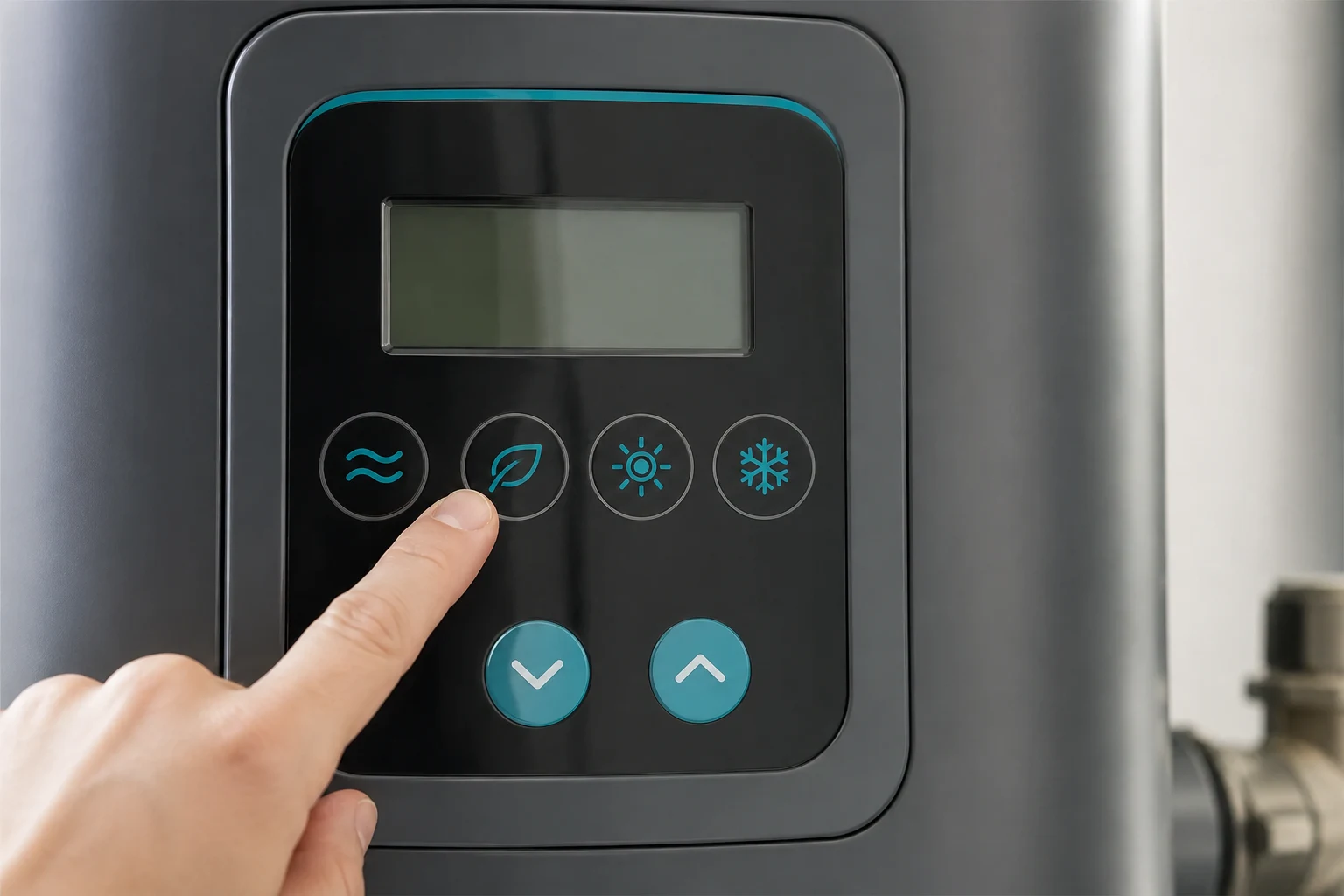 Control panel display of a hybrid heat pump water heater showing the operating mode selection between heat pump, energy saver, high demand, electric, and vacation